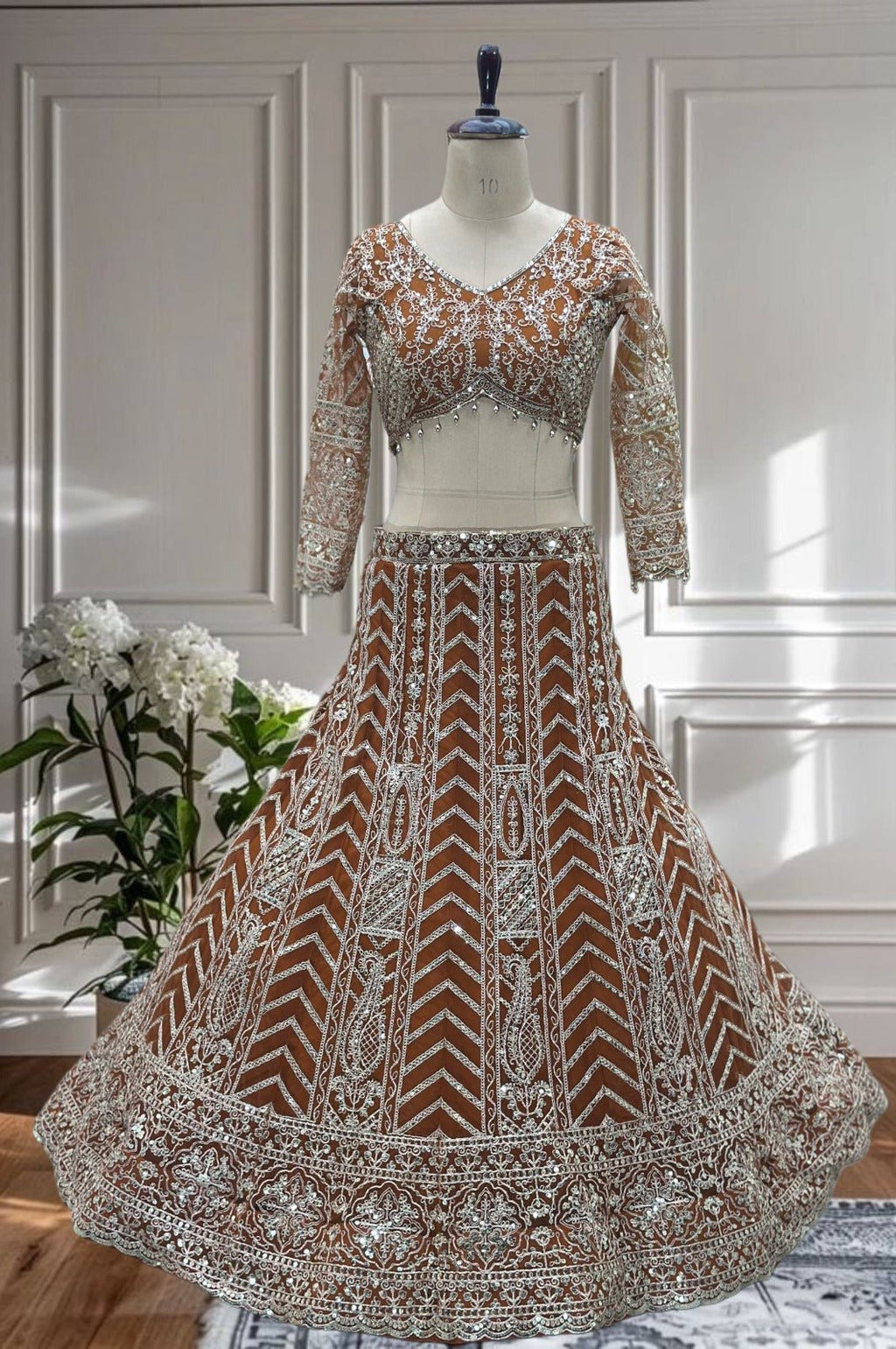 Rust Orange Butterfly Net Lehenga Choli with Sequins and Cording Embroidery