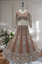 Rust Orange Butterfly Net Lehenga Choli with Sequins and Cording Embroidery