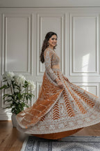 Rust Orange Butterfly Net Lehenga Choli with Sequins and Cording Embroidery