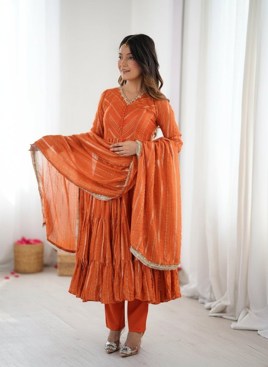 Vibrant Orange Mal Chanderi Ruffle Gown Set with  Real Mirror Handwork.